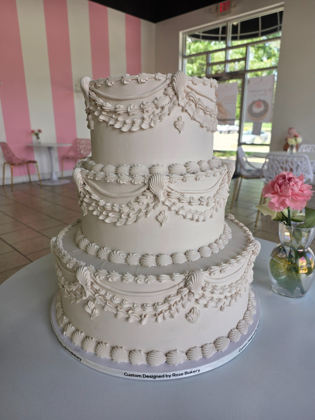 White ruffled wedding cake made by Rose Cake Louisville