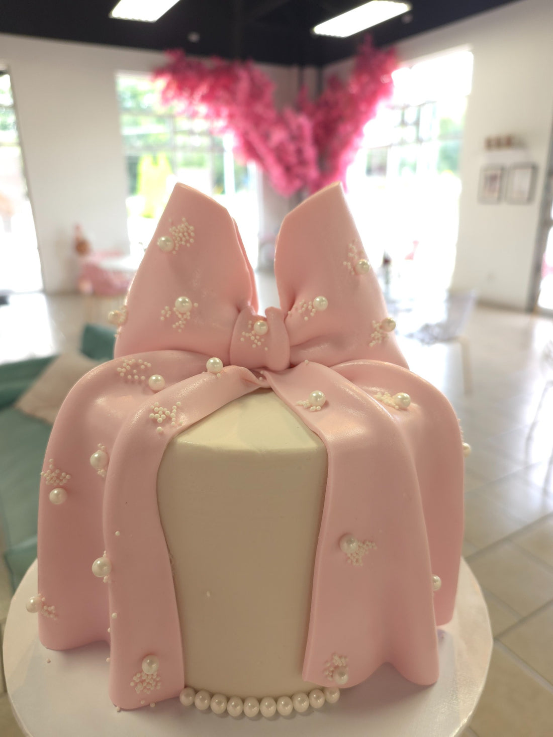 Pink bow birthday cake made by Rose Cake Louisville